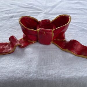 Bow shaped- candle holder